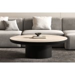 Στρογγυλό coffee table με κεραμικό καπάκι Travertino 3D και μαύρη σαγρέ βάση, τοποθετημένο μπροστά από γκρι modular καναπέ. (Thumb 2)