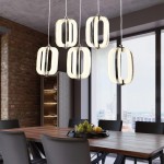 Μοντέρνο κρεμαστό LED φωτιστικό modular σχεδιασμού, τοποθετημένο πάνω από ξύλινη τραπεζαρία σε χώρο με τοίχο από τούβλα και θέα στην πόλη. (Thumb 2)